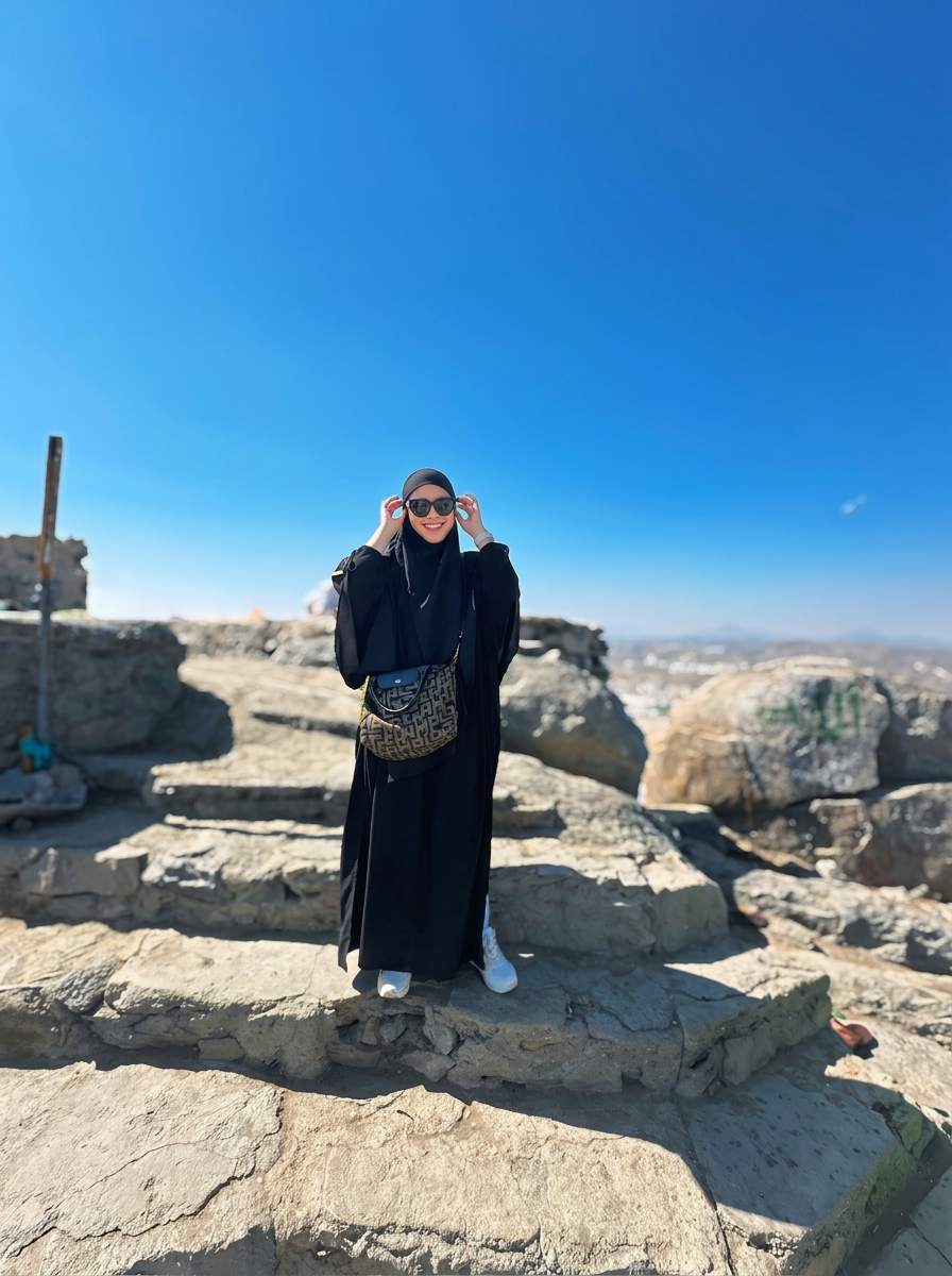 Bella Khaja on the rocky summit of Uhud mountain, Madinah